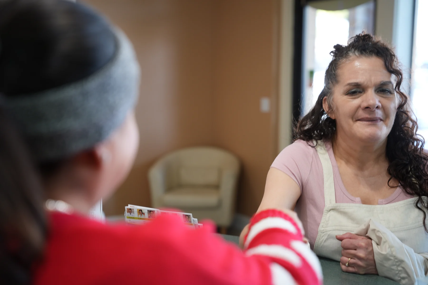 Treatment coordinator walking a patient through financing options