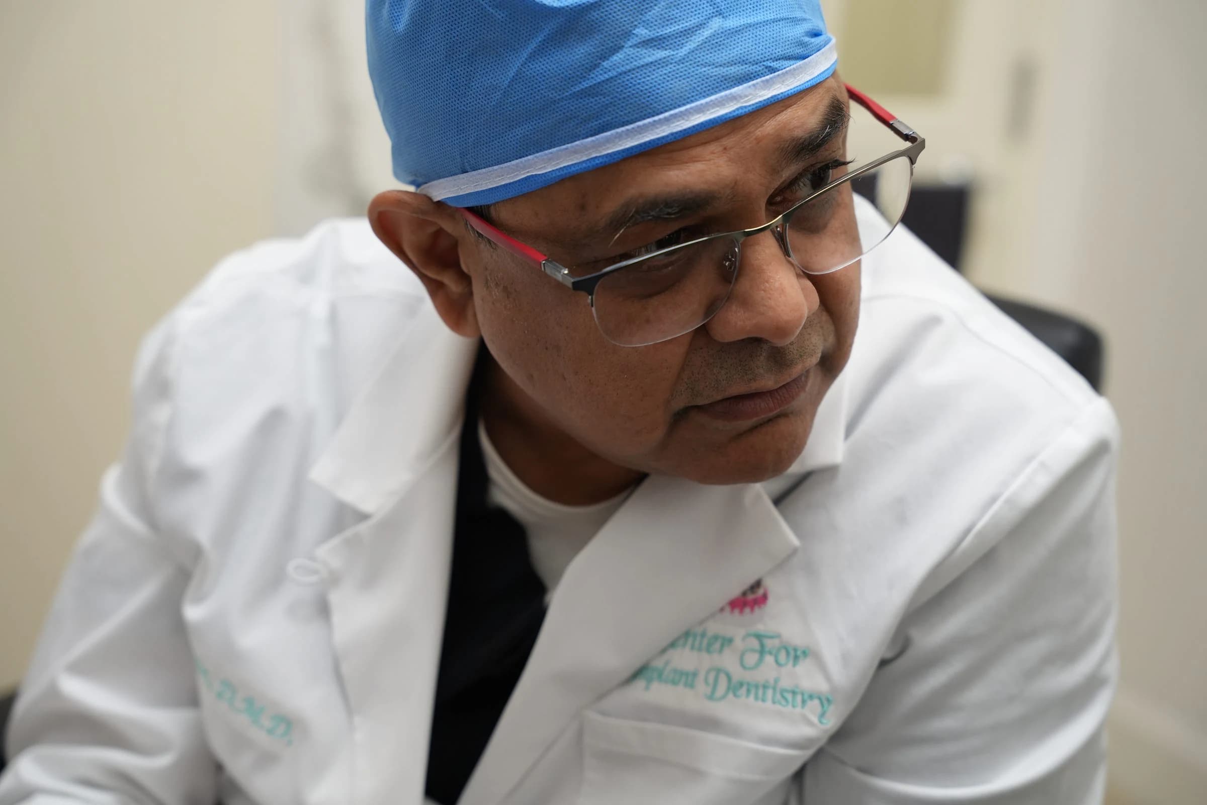 Dr. Sam Jain at work in the surgical suite
