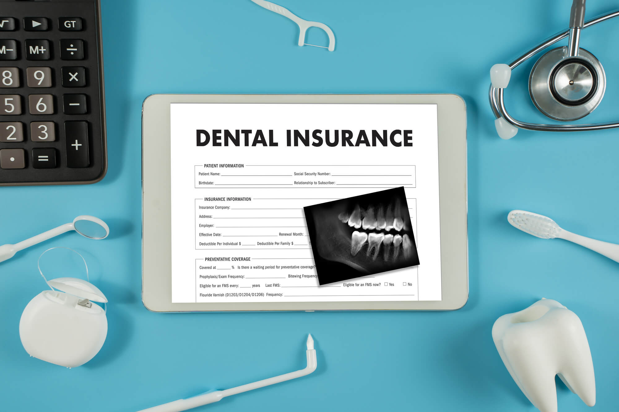 filling out insurance forms before getting Affordable Dental Implants